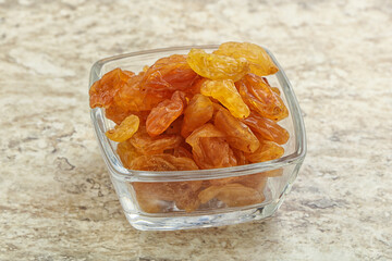 Sweet yellow raisin in the bowl