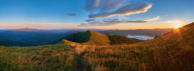 Beautiful sunrise in the mountains. Panorama of summer landscape in the Carpathian Mountains - obrazy, fototapety, plakaty
