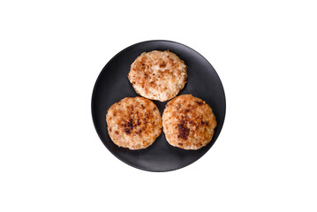 Flat lay composition with grilled meat cutlets for burger on black concrete table