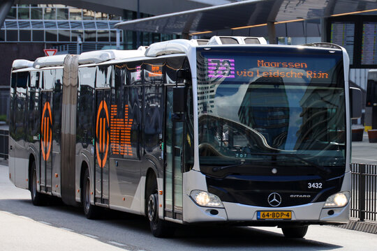 Grey regional  bus of U-OV in the city of Utrecht