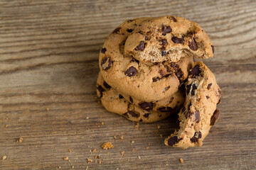 Brown cookies on wooden background