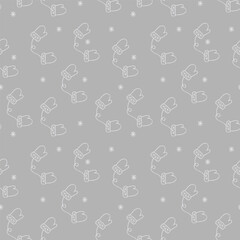 Seamless pattern of winter warm gloves on a gray background