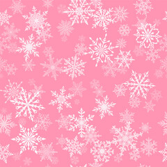 Christmas seamless pattern of beautiful complex snowflakes in pink and white colors. Winter background with falling snow