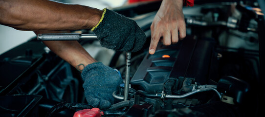 Panoramic banner automotive service mechanic inspect and diagnose car engine issue, repairing and...