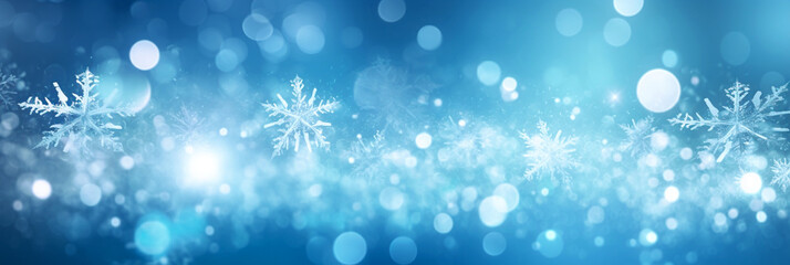 Fototapeta na wymiar Defocused Christmas background with snowflakes and bokeh lights. Panoramic banner. 
