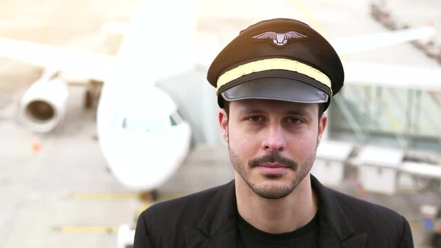 Portrait of Proffesional Male Pilot Captain Working in Aviation Business