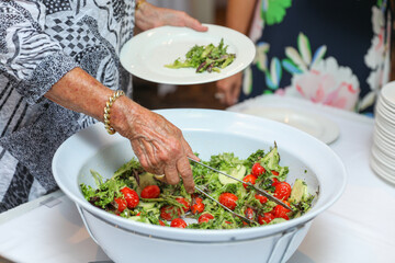 hand delicately savoring food, representing the joy and sensory pleasure of culinary indulgence