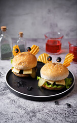Meat burger in the form of funny monster for Halloween holiday