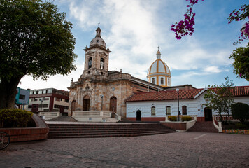 Fototapeta na wymiar San Miguel Arcangel Church located in the Jaime Rook park in the city of Paipa