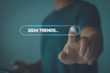 Business people touching to search engine bar with 2024 trends for business planning in the new...