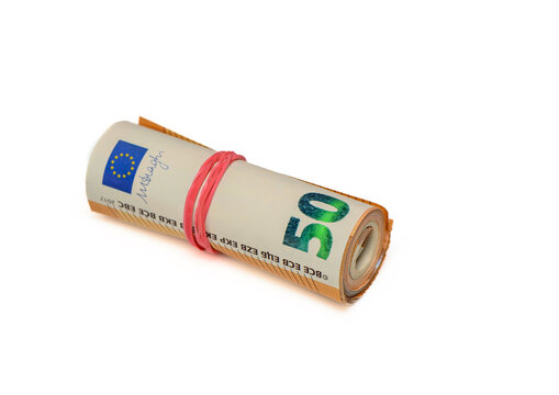 euros rolled into a tube, 50 euro bills on a white background 7