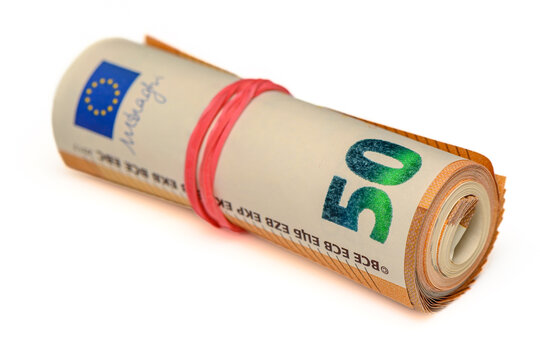 euros rolled into a tube, 50 euro bills on a white background 9
