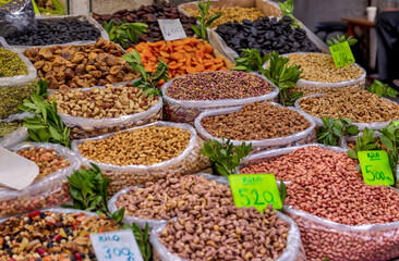 Istanbul, Turkey - July 22,2023: Close up nuts, spices and dried fruits at a street vendor in Istanbul’s Grand Bazaar
