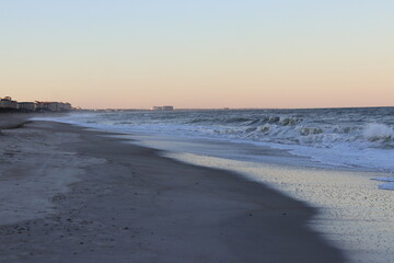 The coastal sunset over the ocean at Jacksonville Beach in Florida.