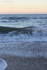 The coastal sunset over the ocean at Jacksonville Beach in Florida.