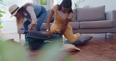 Vacation, suitcase struggle and women packing for travel and adventure in a living room with help. Journey, apartment and luggage for holiday with friends and bag close problem in hotel with clothes
