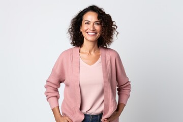 Portrait photography of a Peruvian woman in her 50s against a white background