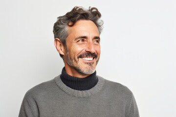 Fototapeta premium Portrait photography of a French man in his 40s against a white background