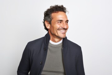 Fototapeta premium Portrait photography of a Colombian man in his 40s against a white background