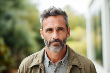 Portrait photography of a serious Colombian man in his 40s