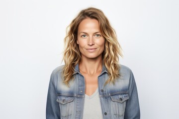 Fototapeta premium Group portrait photography of a Swedish woman in her 30s wearing a denim jacket against a white background