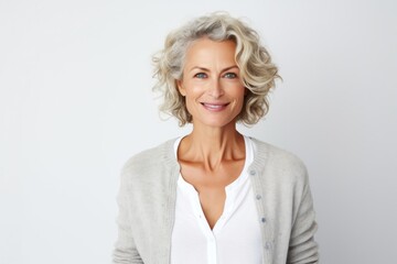 Medium shot portrait photography of a Swedish woman in her 40s against a white background