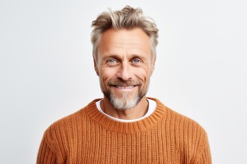 Obraz premium Medium shot portrait photography of a Swedish man in his 40s wearing a cozy sweater against a white background