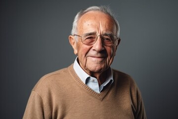 Obraz premium Medium shot portrait photography of a Italian man in his 90s against a minimalist or empty room background