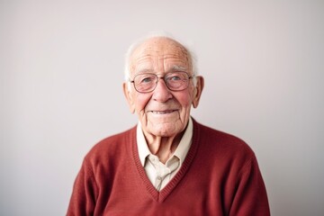 Obraz premium Medium shot portrait photography of a 100-year-old elderly Swedish man against a minimalist or empty room background