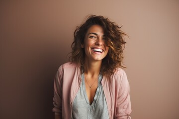 Portrait photography of a cheerful Italian woman in her 30s against an abstract background