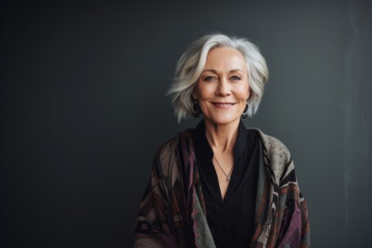 Portrait photography of a Swedish woman in her 50s against an abstract background