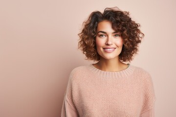 Fototapeta premium Portrait photography of a French woman in her 30s wearing a cozy sweater against a pastel or soft colors background