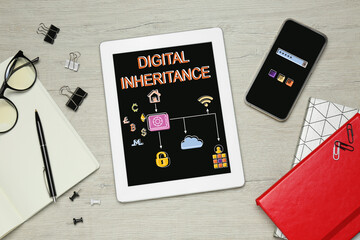 Tablet with text Digital Inheritance and scheme with many different icons on screen. Workplace with...