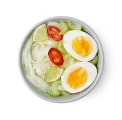 Bowl of delicious rice noodle soup with celery and egg isolated on white, top view