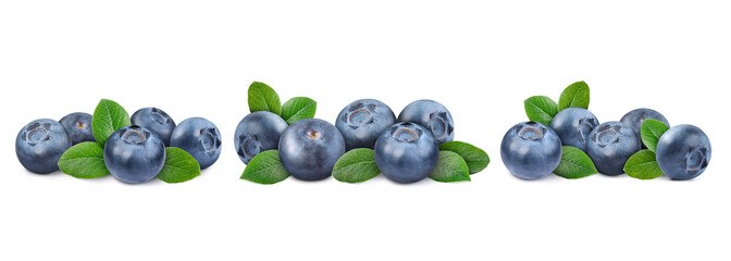 Set with fresh blueberries and green leaves isolated on white