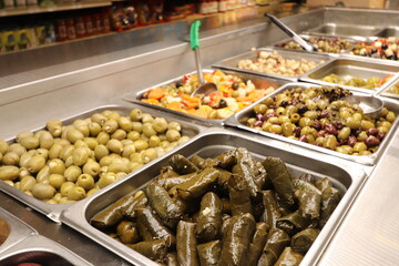 Assortments of olives are ready for purchase at the market. Pittsburgh, Pennsylvania. 