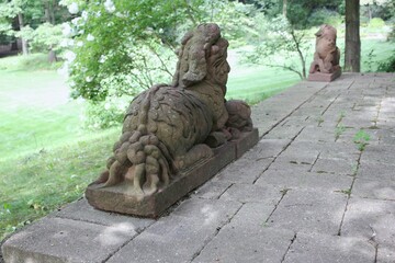 A dog statue in the park.