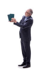 Old businessman holding books isolated on white