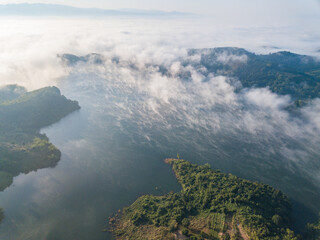 Aerial view of Mae Suai reservoir in the morning located at a narrow part of a valley downstream of...
