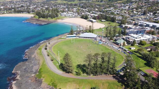 Aerial drone view of Kiama on the New South Wales South Coast, Australia showing Kiama&rsquo;s Surf Beach and Kendalls Beach on a sunny day 