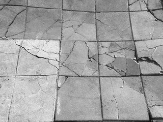 Broken slabs footpath in the city. - 645881808