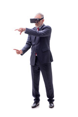 Obraz premium Old businessman wearing virtual glasses isolated on white