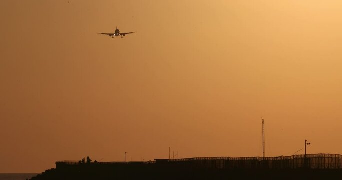 aeroplane, plane landing during dusk, sunset