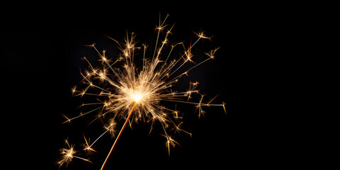 sparklers isolated on black background with copy space