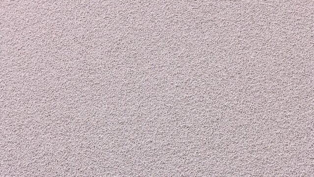 Pellets of ammonium nitrate as background, top view. Mineral fertilizer
