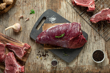 raw meat on a cutting board