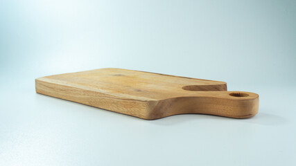 Handmade wood cutting board on white background