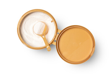 Collagen powder or milk powder in can with spoon isolated on white background with clipping path, top view, flat lay.