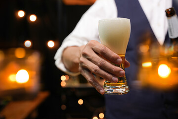 Bartender Serve beer, on wood bar, 