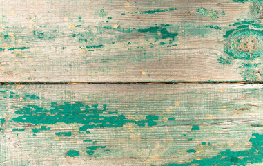 Fototapeta na wymiar Old wooden boards painted with green paint. Background